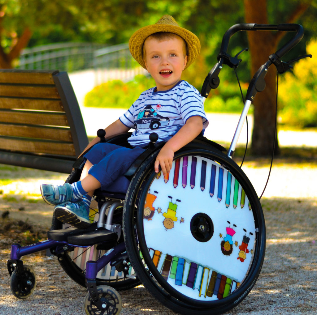 Paediatric wheelchairs Mio by SORG wheelchair technology, wheelchair child in the park 